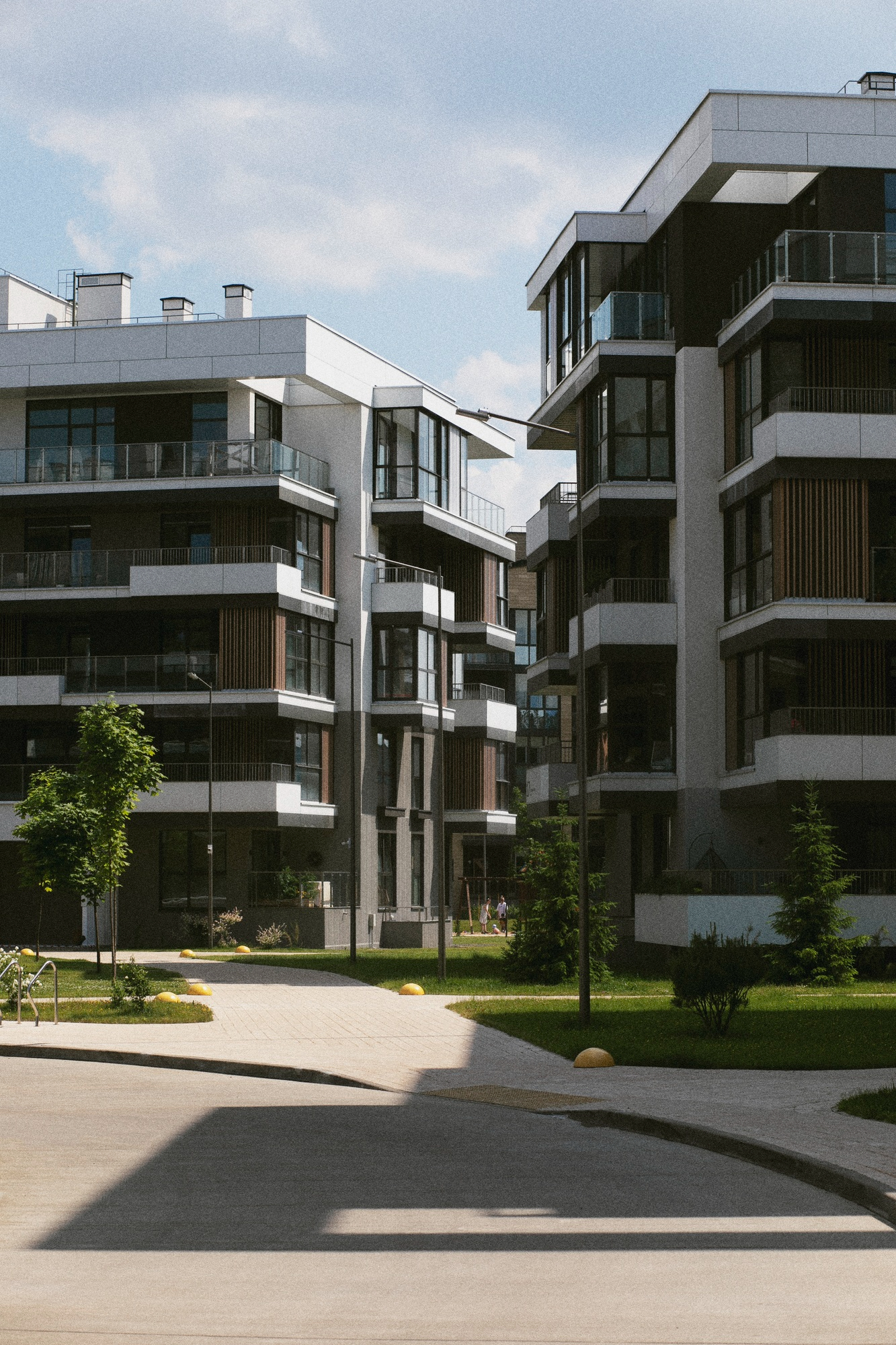 Modern apartment building exterior, representative of Sterling Court's architecture